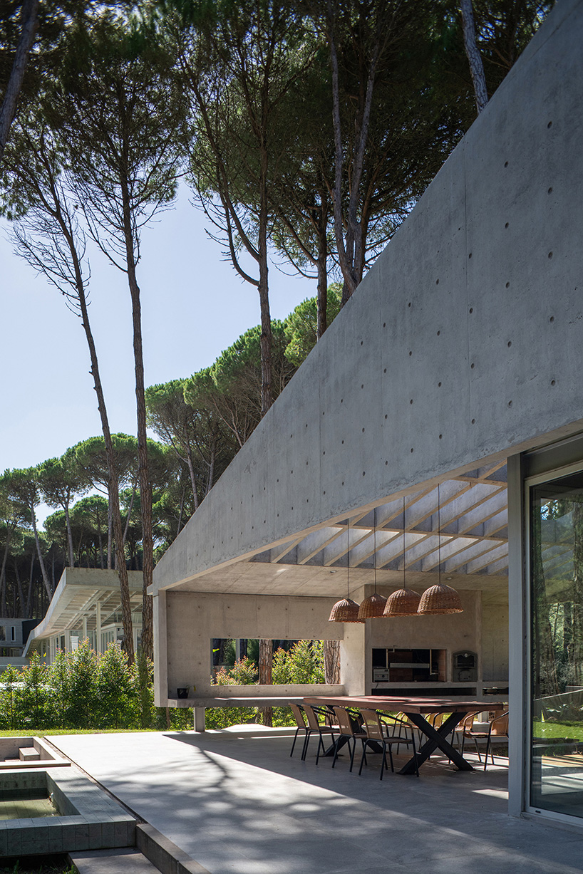 triangular concrete wedge shelters estudio galera's kairos house in argentina