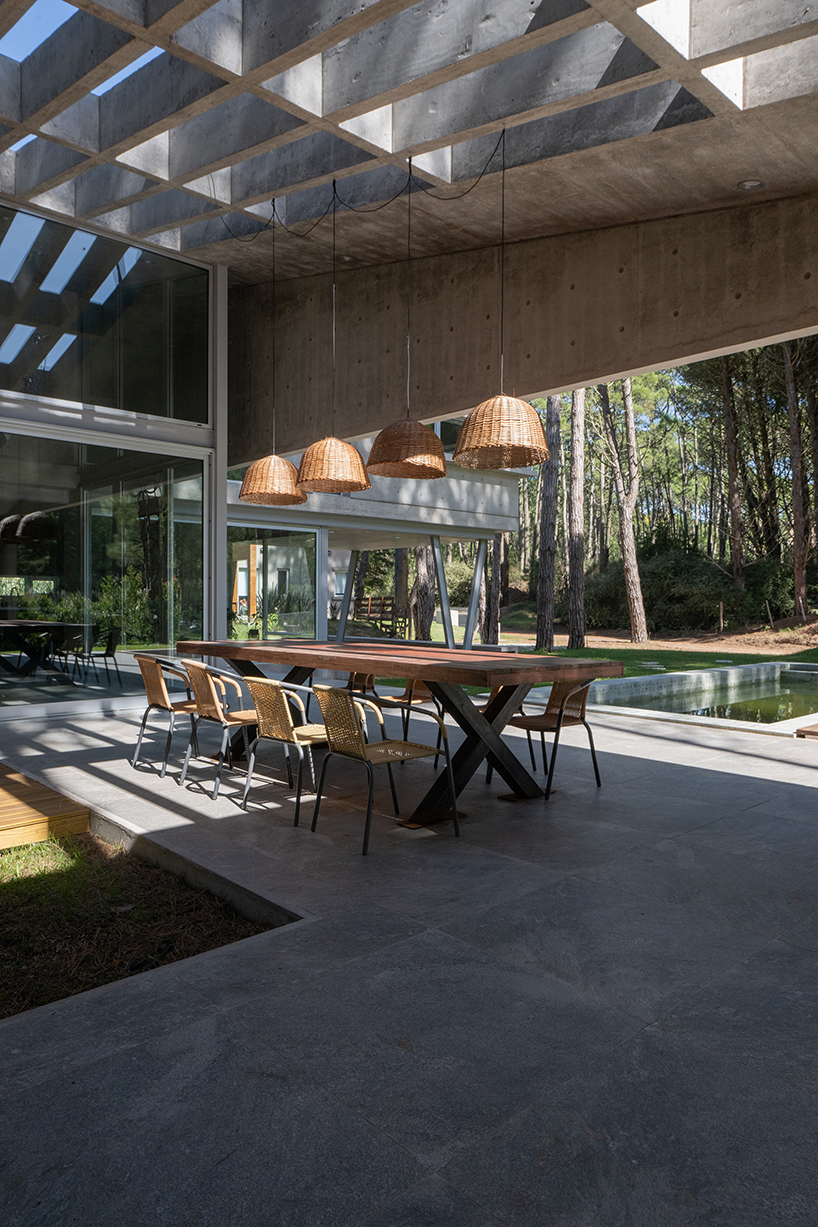 triangular concrete wedge shelters estudio galera's kairos house in argentina