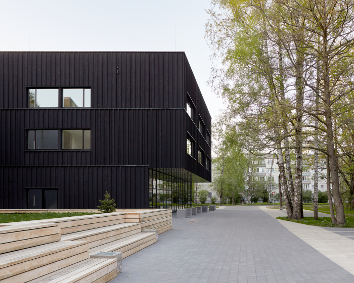 riga art and media school is a clapperboard inspired monochrome box in latvia