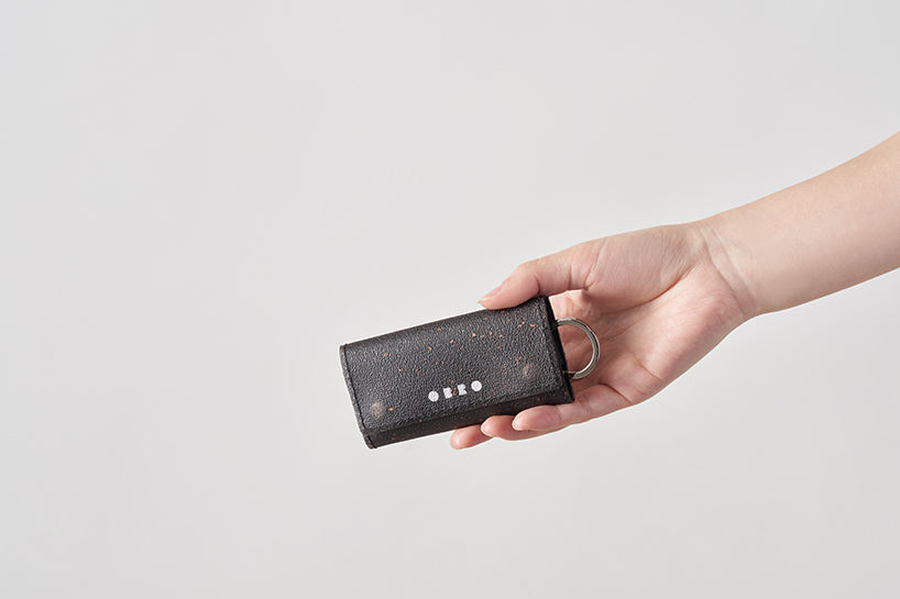 wearable collection repurposes leftover leather powder as translucent composite material