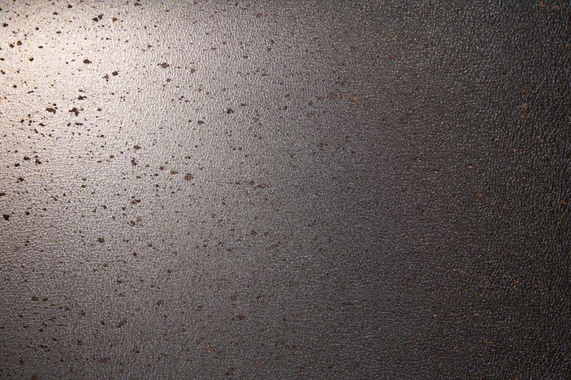 wearable collection repurposes leftover leather powder as translucent composite material