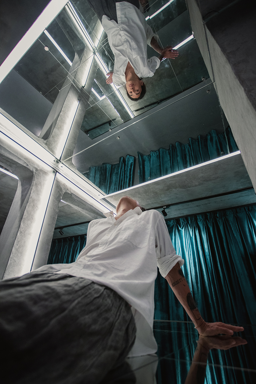 deserted 45-year-old basement is transformed into mirror-clad art space in guangzhou, china