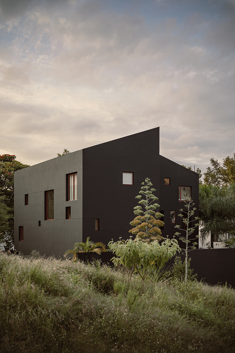 a dark house in xalapa inspired by the natural landscape by lopez gonzalez studio 12