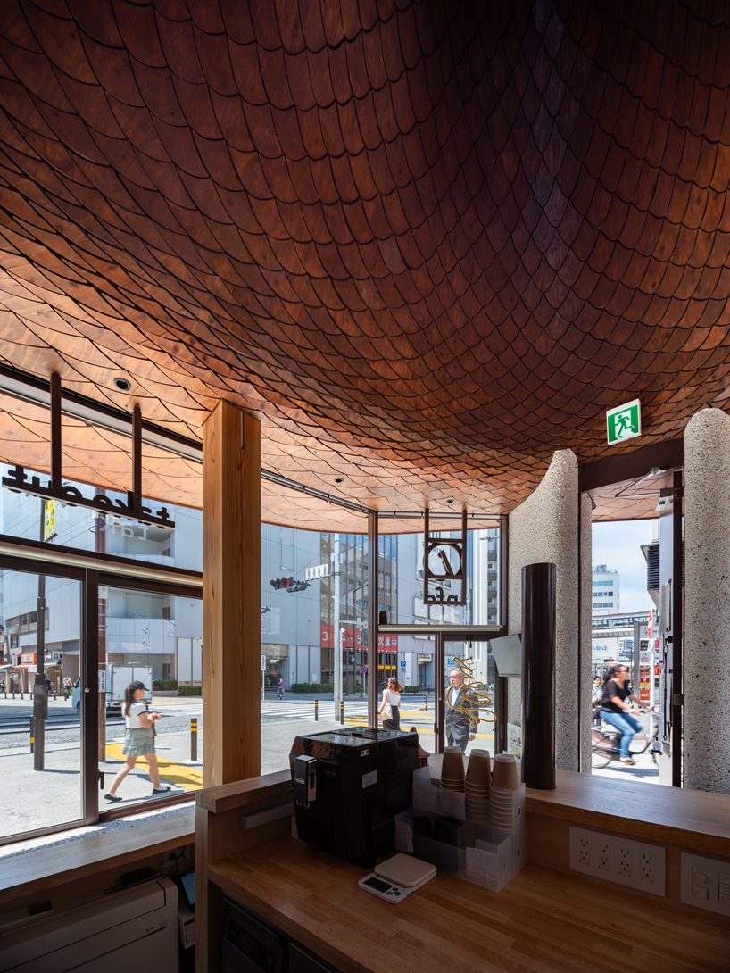 sculptural copper canopy tops micro-landmark community hub in tokyo by nikken sekkei - 6