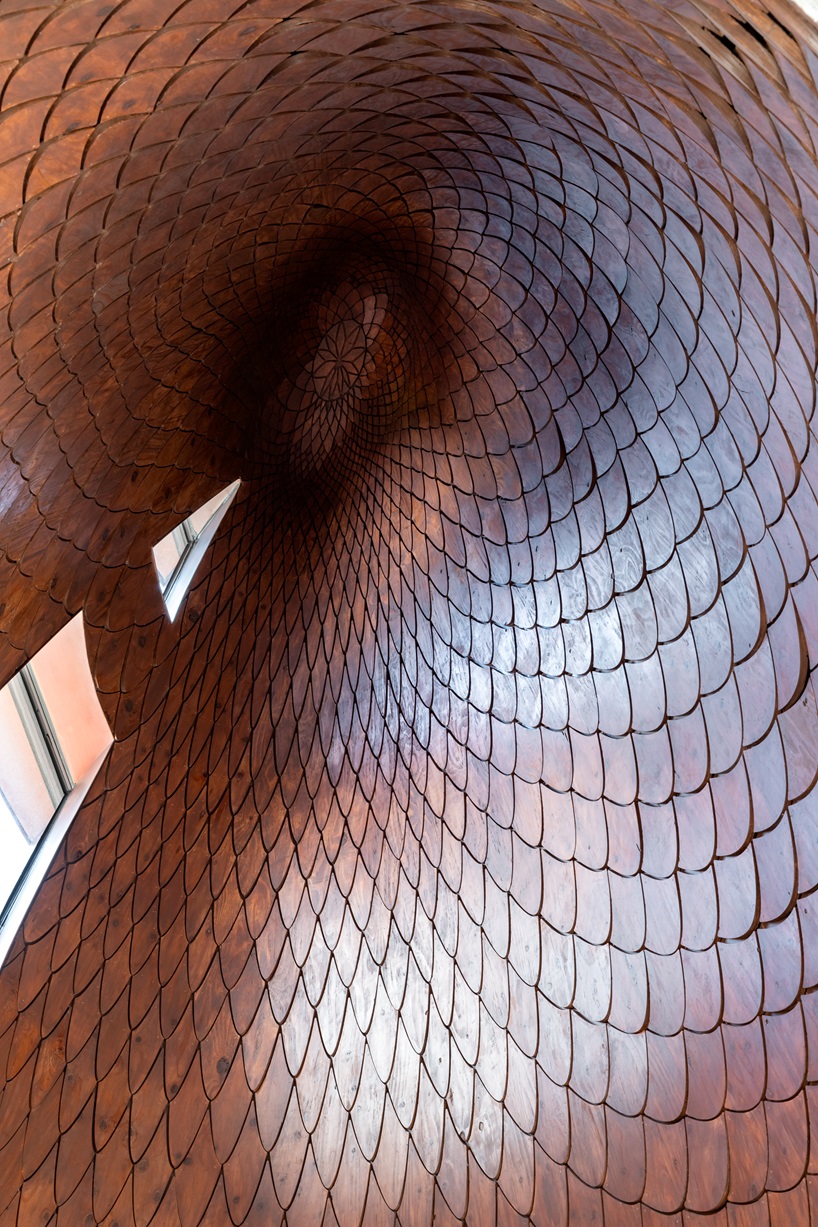 sculptural copper canopy tops micro-landmark community hub in tokyo by nikken sekkei - 7