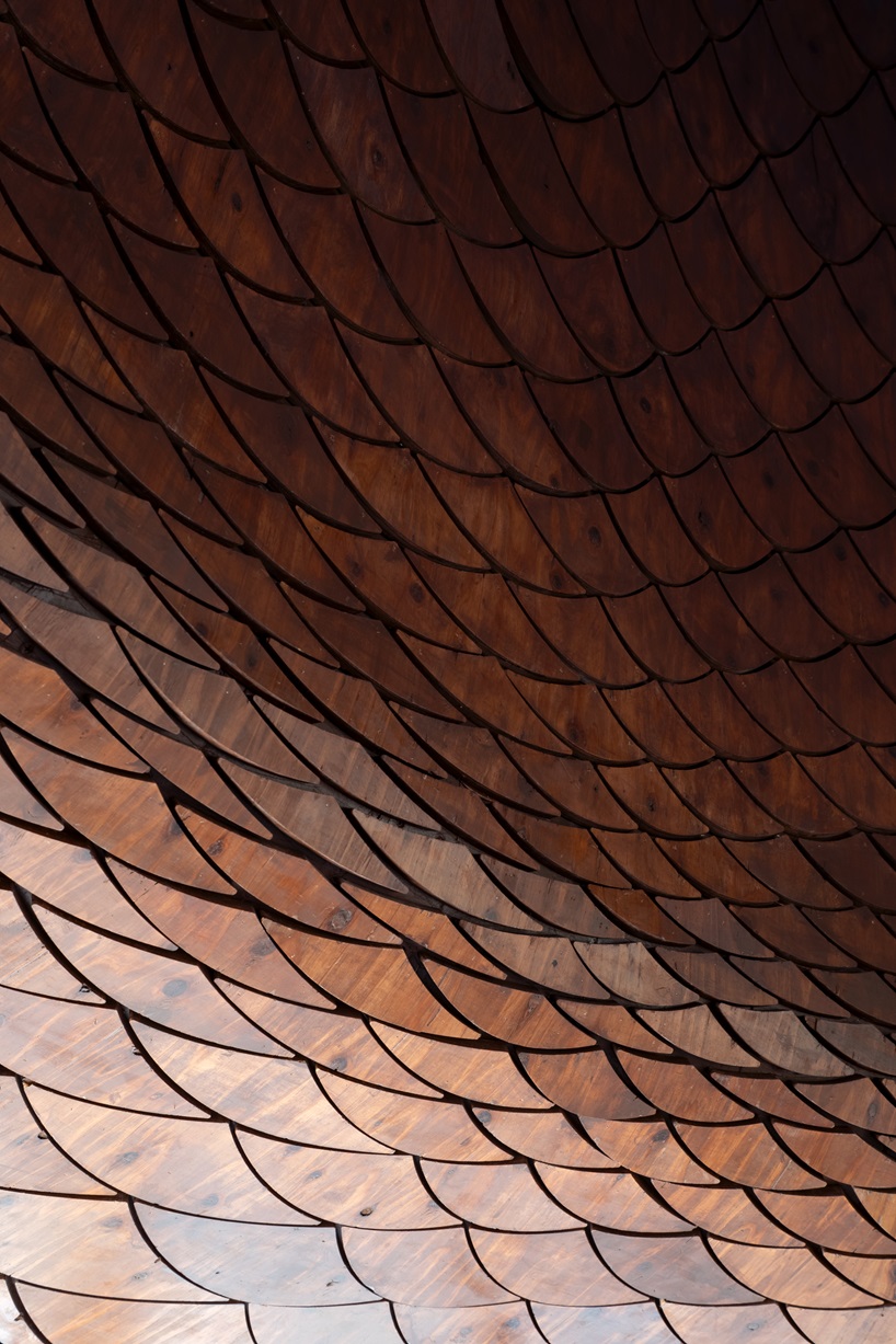 sculptural copper canopy tops micro-landmark community hub in tokyo by nikken sekkei - 8