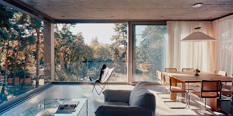 concrete columns lift residence above forested terrain in georgia