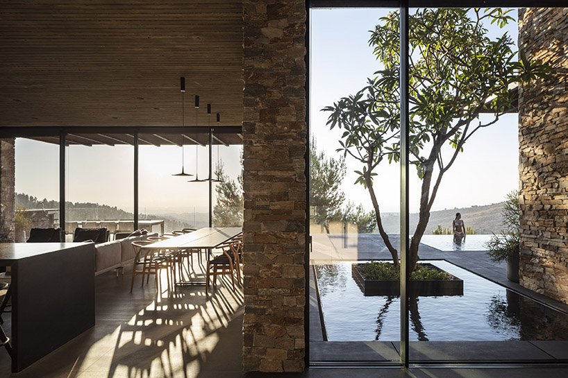 contemporary stone villa by architects dana oberson calls for coexistence on the borders of abu gosh neve ilan israel 4