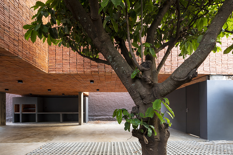 VU4B house composes minimal geometric brick-built volumes in paraguay