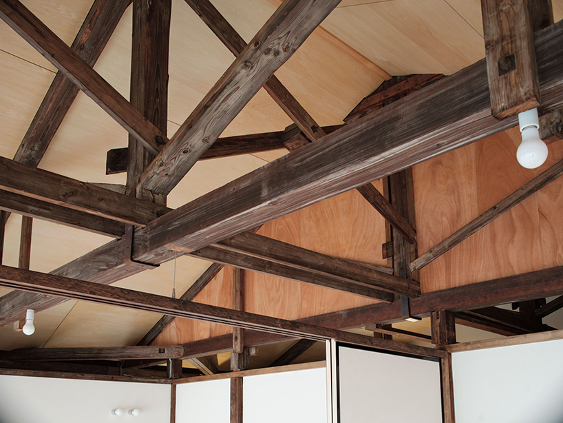 renovated wooden house boasts bright red facade in central tokyo