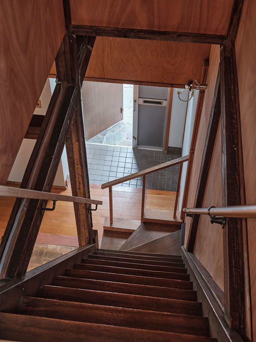renovated wooden house boasts bright red facade in central tokyo