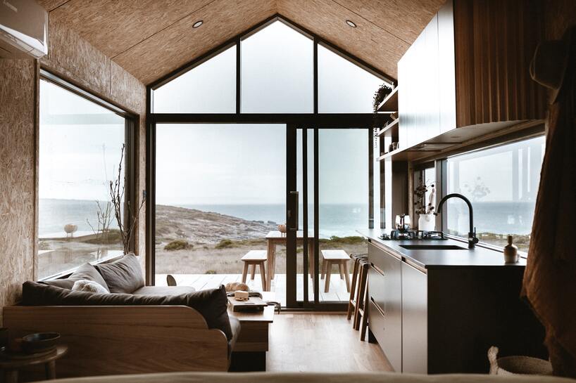 new off grid luxury tiny cabin on a secret cliffside spot in australia 3