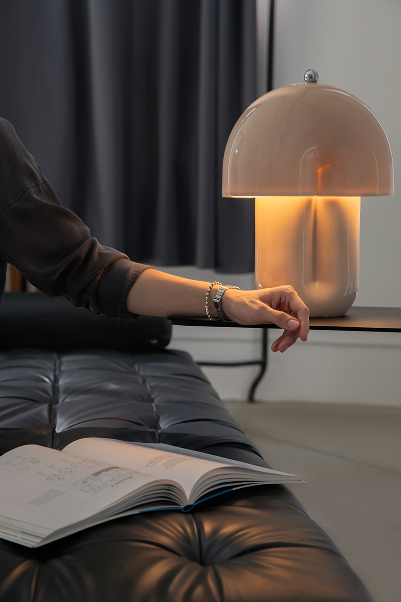 split ceramic curves cast soft reflected light in dimmable table lamp - 3