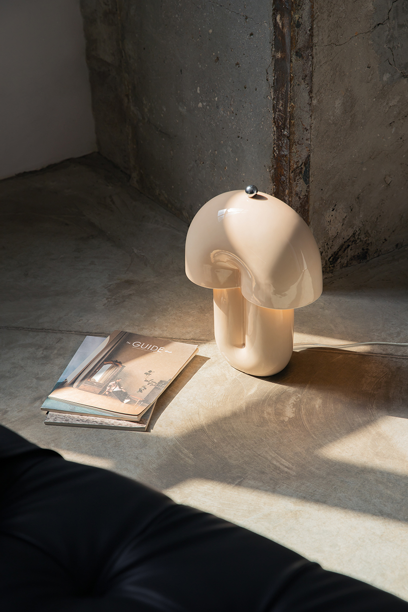 split ceramic curves cast soft reflected light in dimmable table lamp - 4