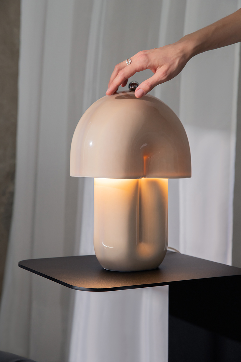 split ceramic curves cast soft reflected light in dimmable table lamp - 5