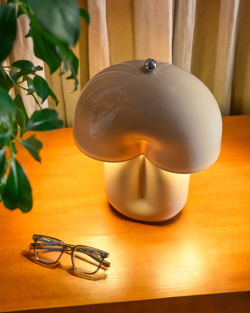 split ceramic curves cast soft reflected light in dimmable table lamp - 8