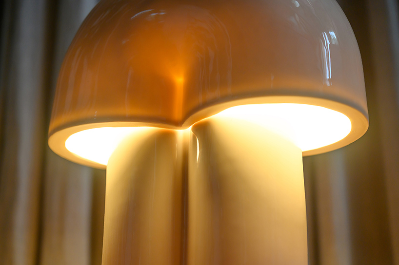 split ceramic curves cast soft reflected light in dimmable table lamp - 9