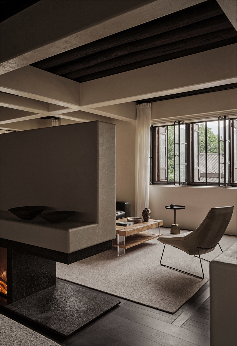 traditional tiled roofs crown the stepped modules of office and cafe space in china