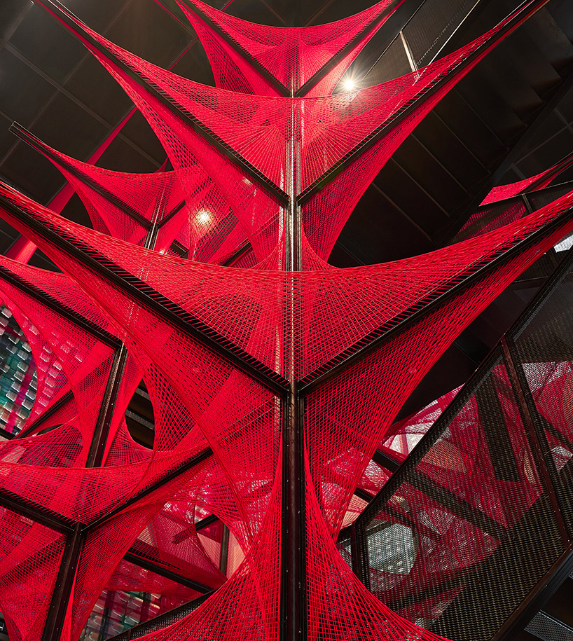 150.000 meters of vibrant red brocade threads compose installation in china