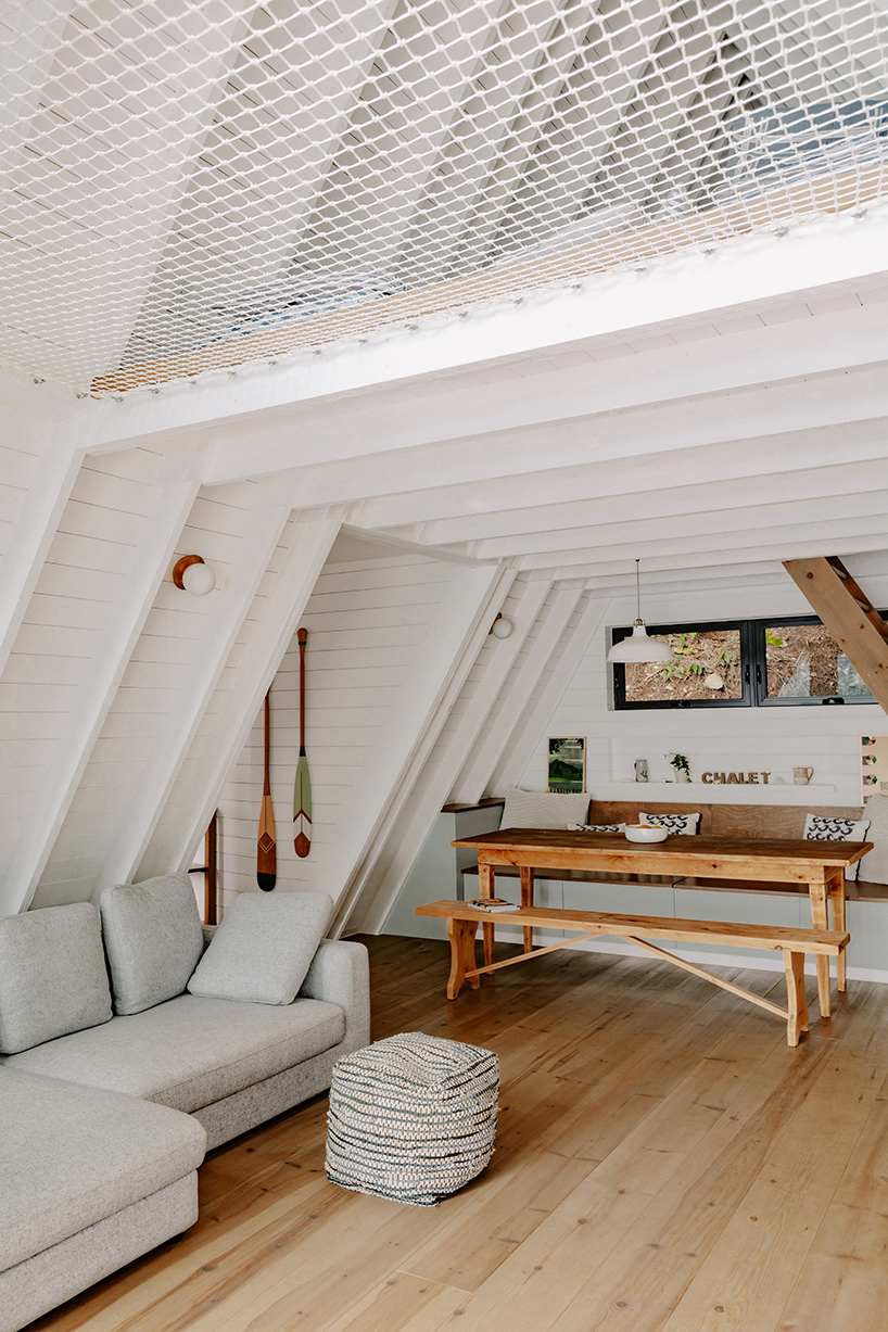 matière première architecture revives wooden A-frame cottage in canada