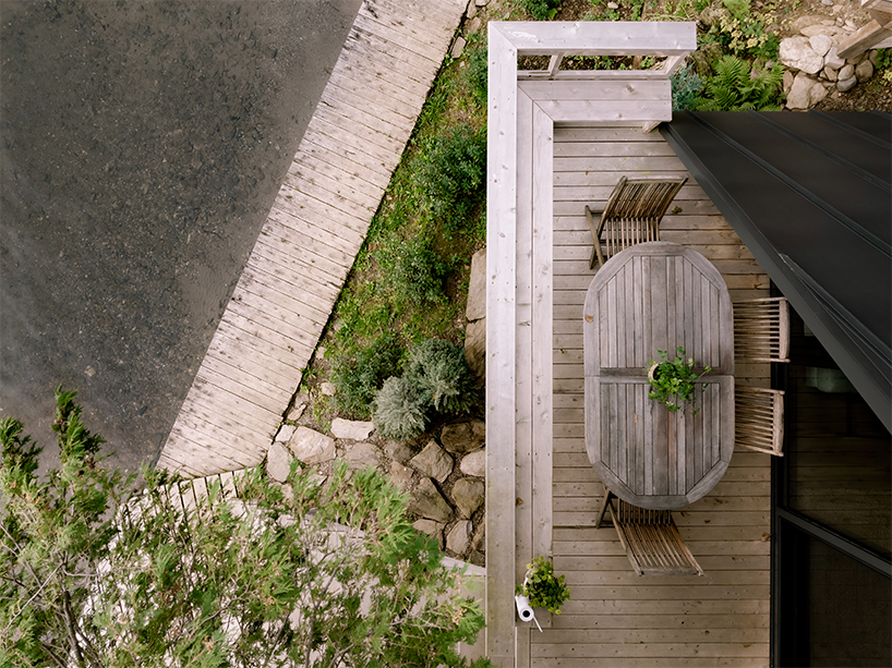 matière première architecture revives wooden A-frame cottage in canada