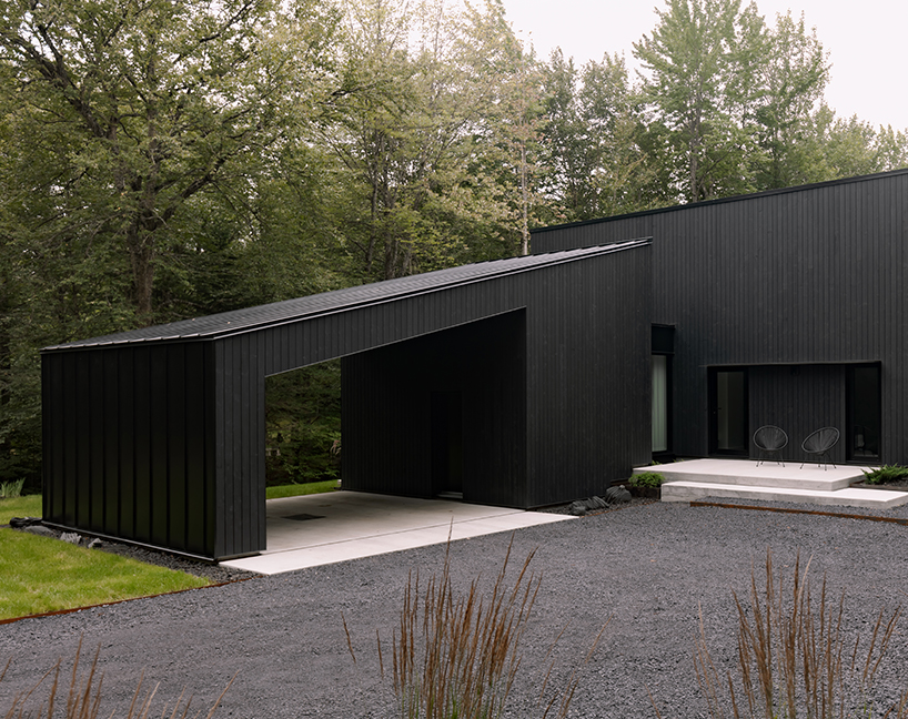 monochromatic house's geometric forms frame natural plateau in canada