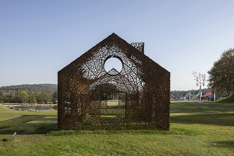 ivy-clad vanished house by field conforming studio encapsulates feelings of remembrance in wuhan cemetery