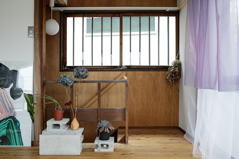 a mint green house in yokohama gets uplifted by ROOVICE after 60 years of decay