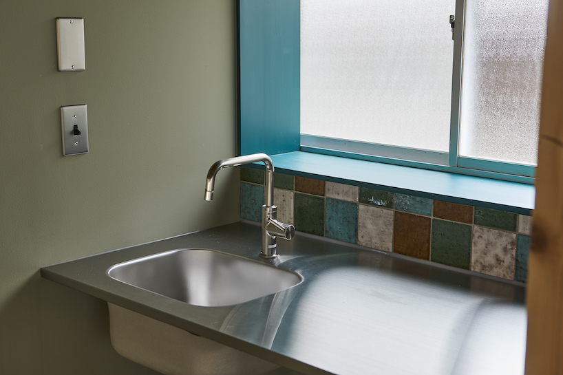 ROOVICE draws from studio ghibli interiors to renovate pharmacy in yokohama