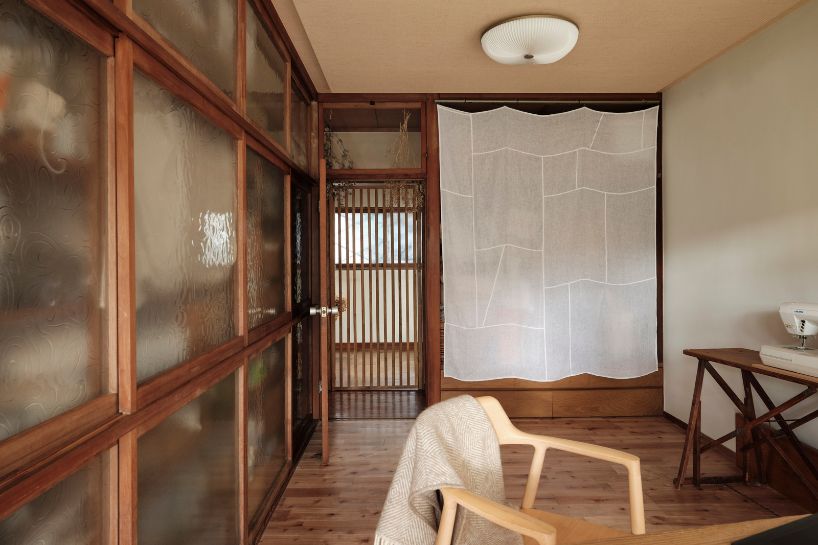ROOVICE revives mid-century japan home through layered wooden interiors