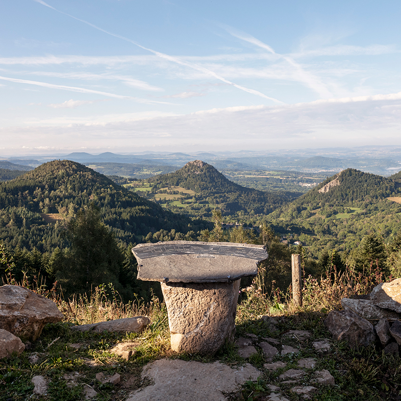suchaillou stone shelter embeds within rocky outcrop along santiago de compostela route