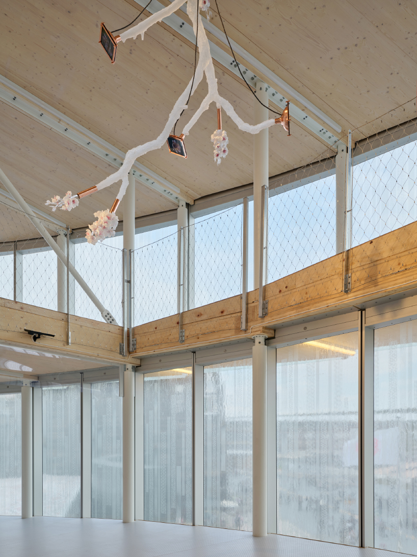 translucent glass facade outlines czech pavilion's spiral form at expo 2025 osaka