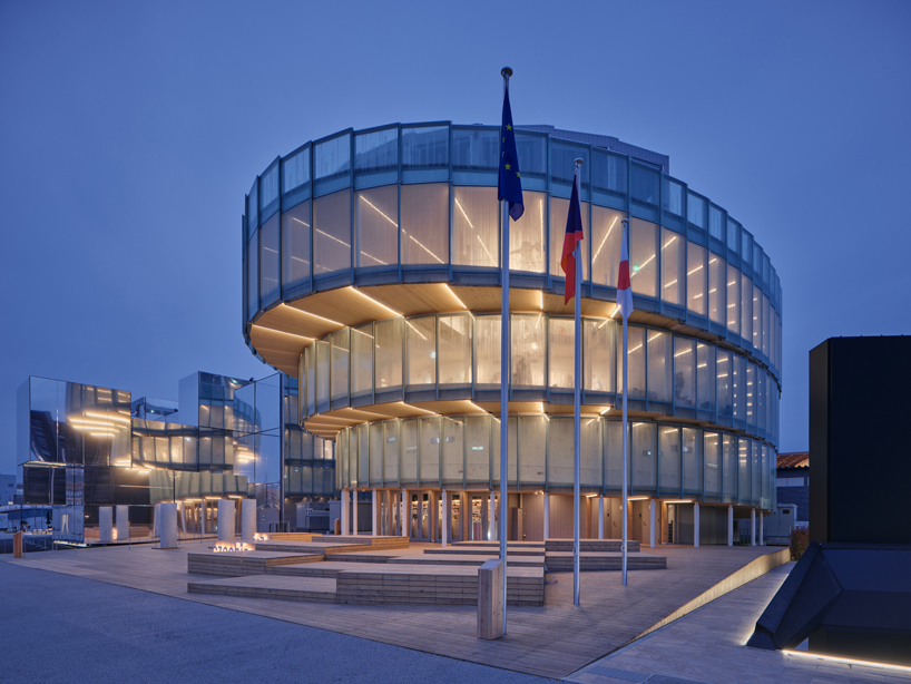 translucent glass facade outlines czech pavilion's spiral form at expo 2025 osaka