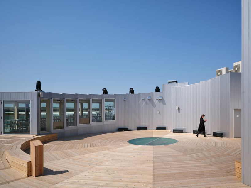 translucent glass facade outlines czech pavilion's spiral form at expo 2025 osaka
