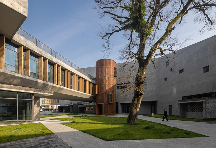 zhejiang lishui guyanhuaxiang art center by line+ spreads a fragmented ...