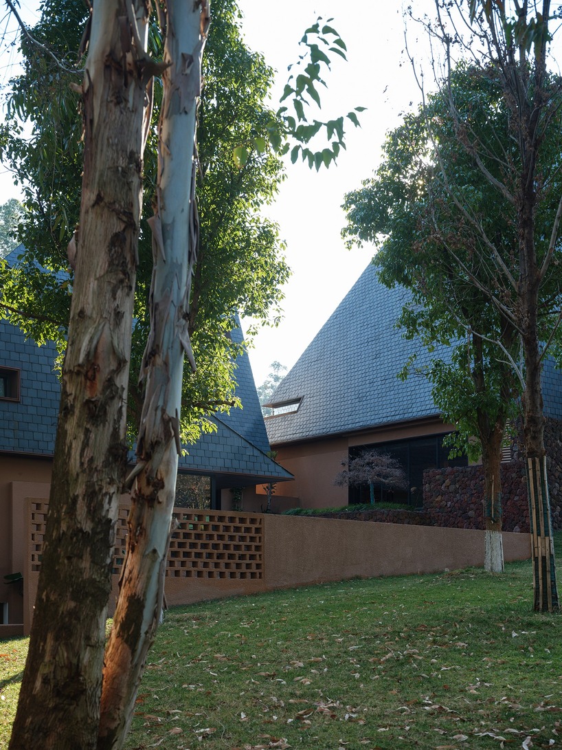 line+ embeds a cluster of sculptural roofed volumes within red-earth valley in china - 5