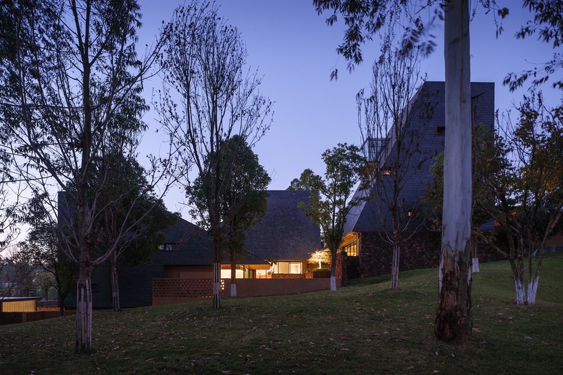 line+ embeds a cluster of sculptural roofed volumes within red-earth valley in china - 9