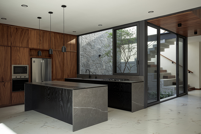 stone-built casa makay in mexico develops around central staircase and atrium