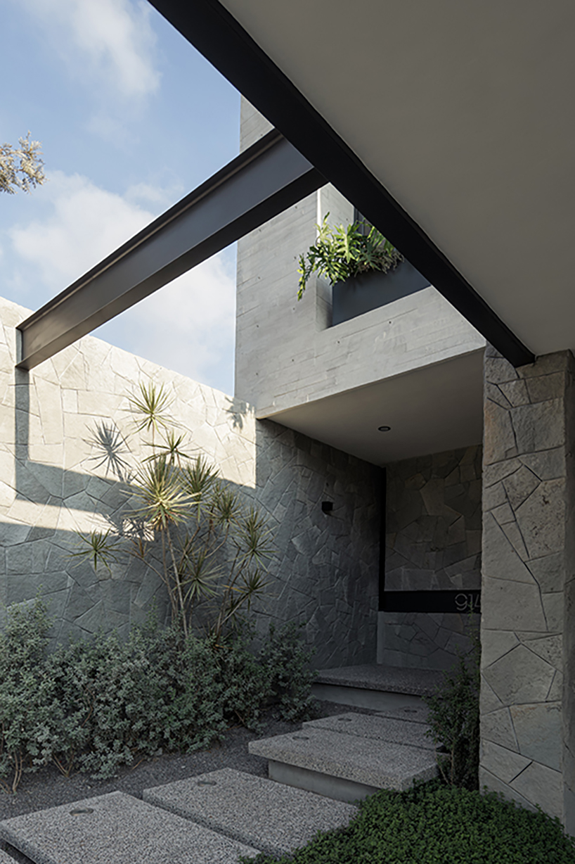 stone-built casa makay in mexico develops around central staircase and atrium