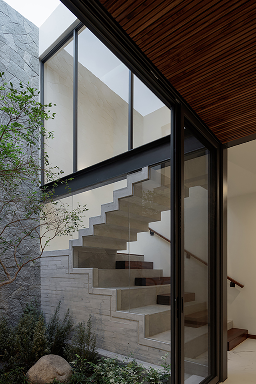 stone-built casa makay in mexico develops around central staircase and atrium