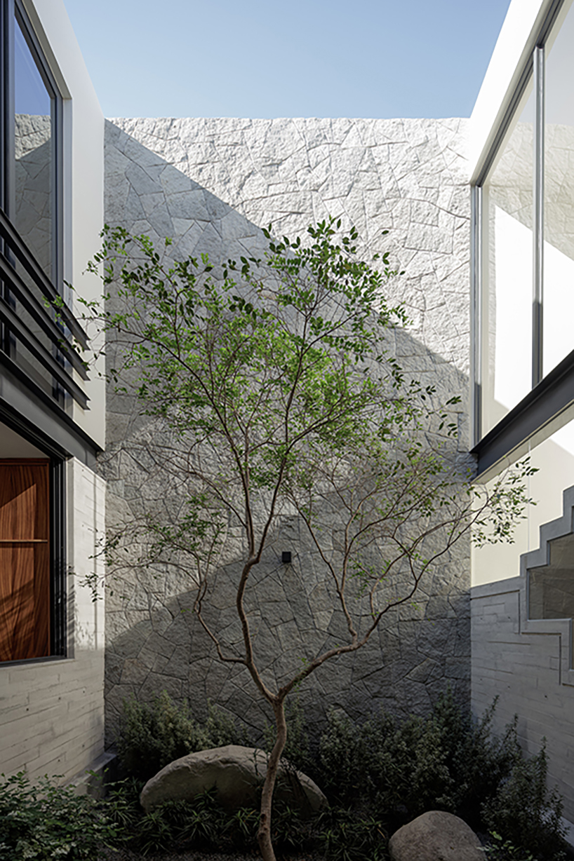 stone-built casa makay in mexico develops around central staircase and atrium