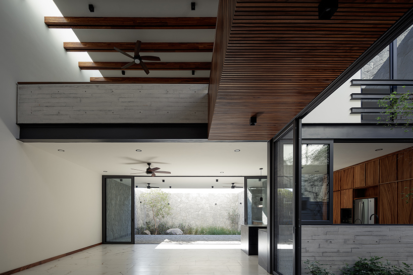 stone-built casa makay in mexico develops around central staircase and atrium