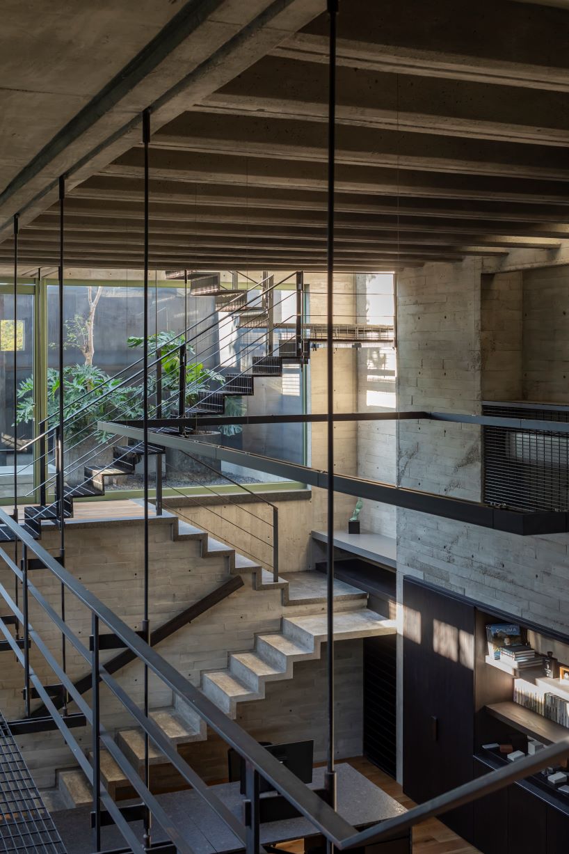 assemblage of concrete, stone, and steel blocks shape di frenna arquitectos' mexico office