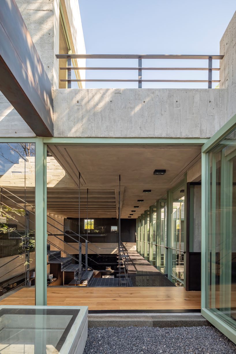 assemblage of concrete, stone, and steel blocks shape di frenna arquitectos' mexico office