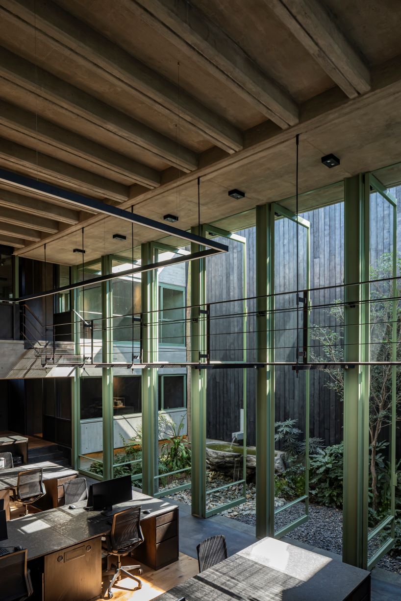 assemblage of concrete, stone, and steel blocks shape di frenna arquitectos' mexico office
