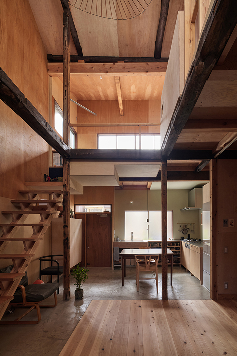 renovation project in tokyo arranges wooden house's interior layout in spiral sequence