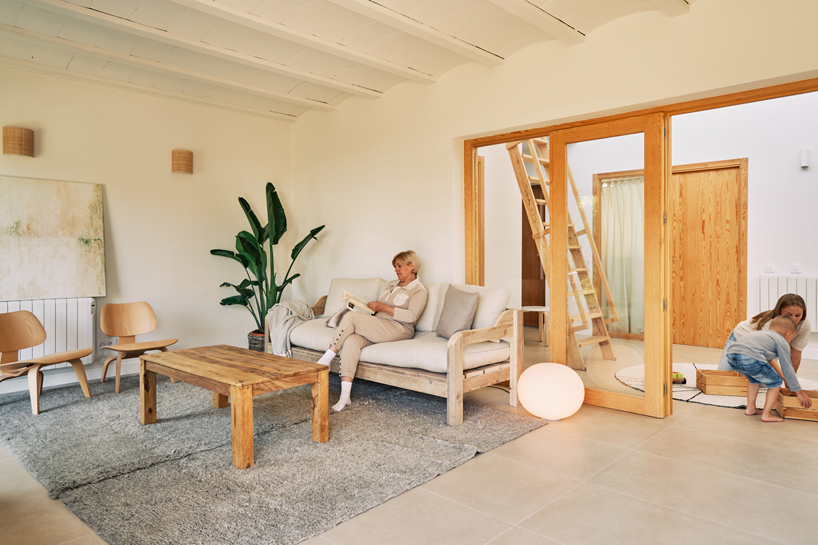 slow studio's passive house in spain unfolds around bioclimatic atrium