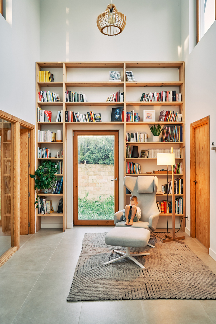 slow studio's passive house in spain unfolds around bioclimatic atrium
