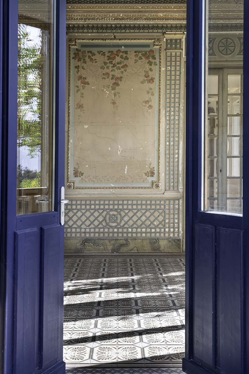 old french house's renovation revives intricate wood flooring and wall frescoes