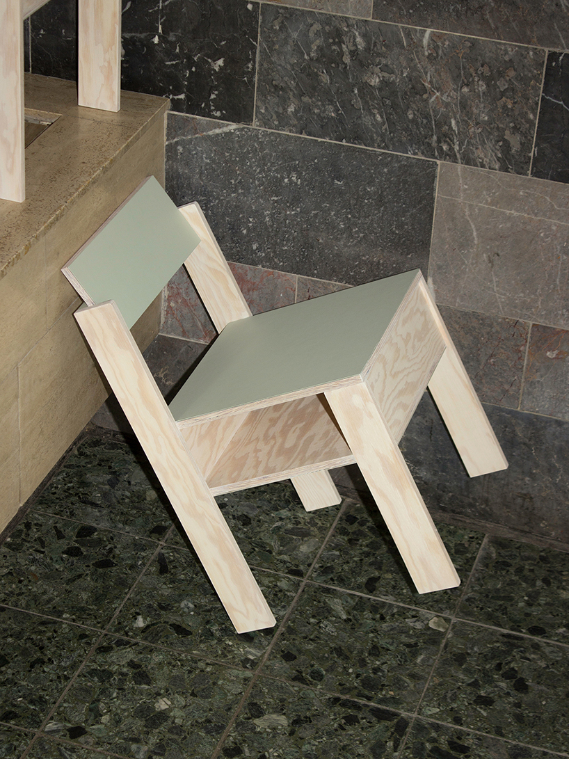 a pair of twin wooden chairs by A204 reconfigure into tables with drawers and shelving units